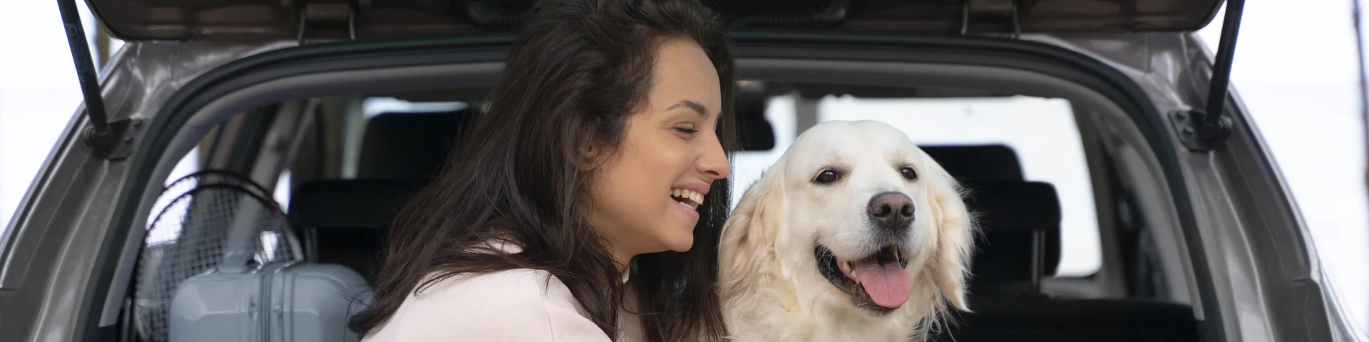 Woman Holding Dog Medium Shot