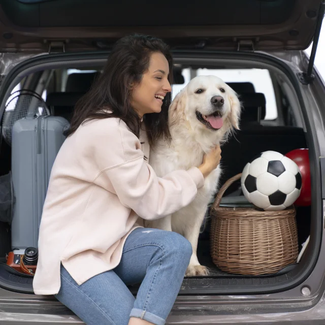 Woman Holding Dog Medium Shot