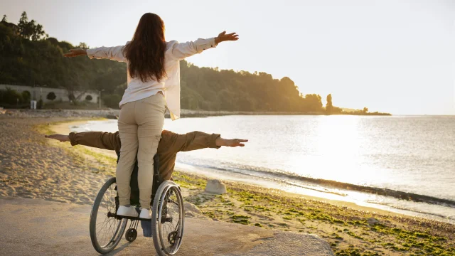 Full Shot Disabled Man Woman Vacation